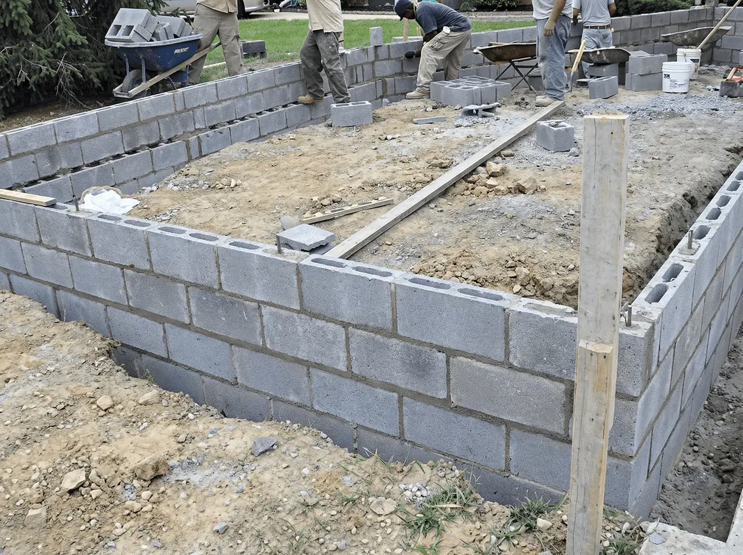 Professionals building a foundation with blocks in Columbus, OH